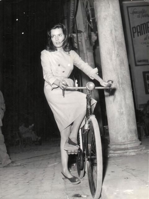 #43 Belinda Lee riding a bike.
