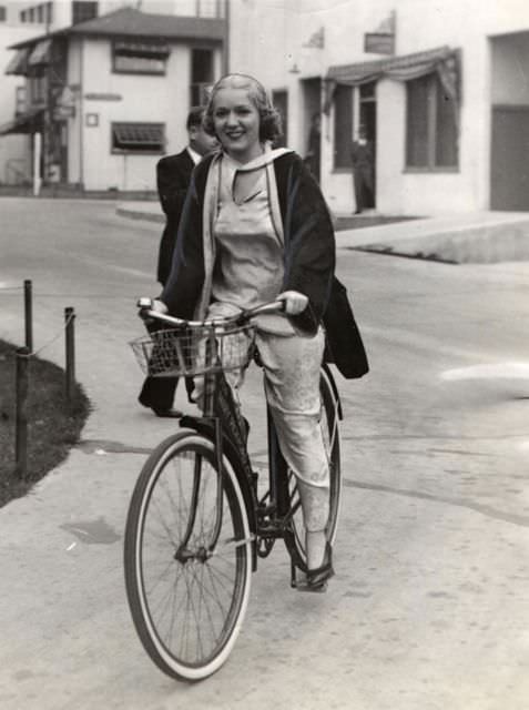 #5 Mary Pickford riding a bike.