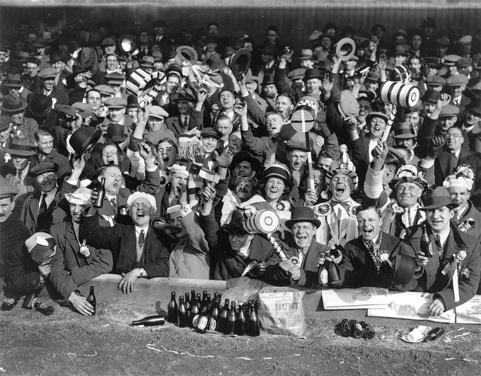 #13 Supporters of West Ham United FC at a FA Cup semi-final match against Everton at Wolverhampton Wanderers ground, The Hawthorns. (Photo by Topical Press Agency/Getty Images). 1933