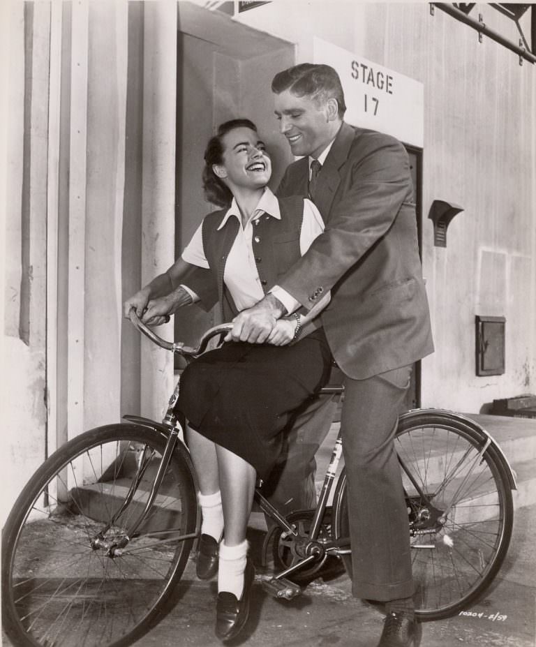 #2 Terry Moore and Burt Lancaster on a bike, 1953