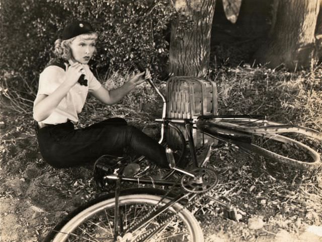 #43 Joyce Compton falls from a bike.