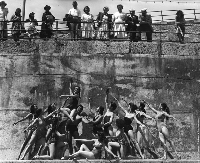 #50 Members of the London Theatre Ballet Company form a frieze-like tableau on the beach at Eastbourne