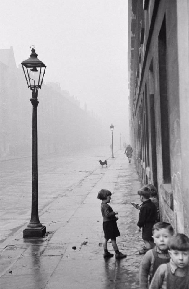 #31 A group of young children on a street in the Gorbals.