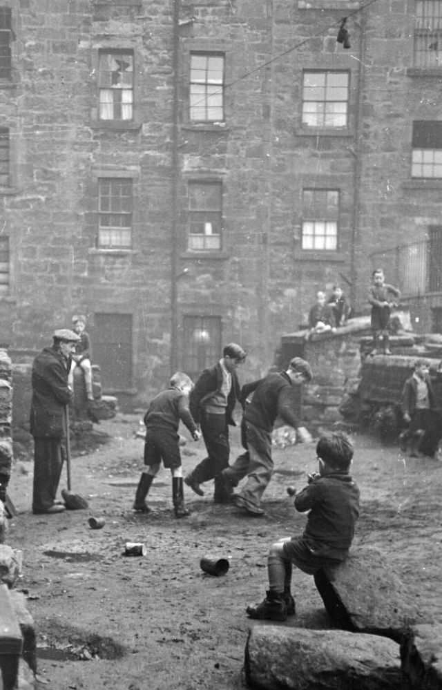 #34 Without proper balls, children had to use whatever they could to enjoy a game of football