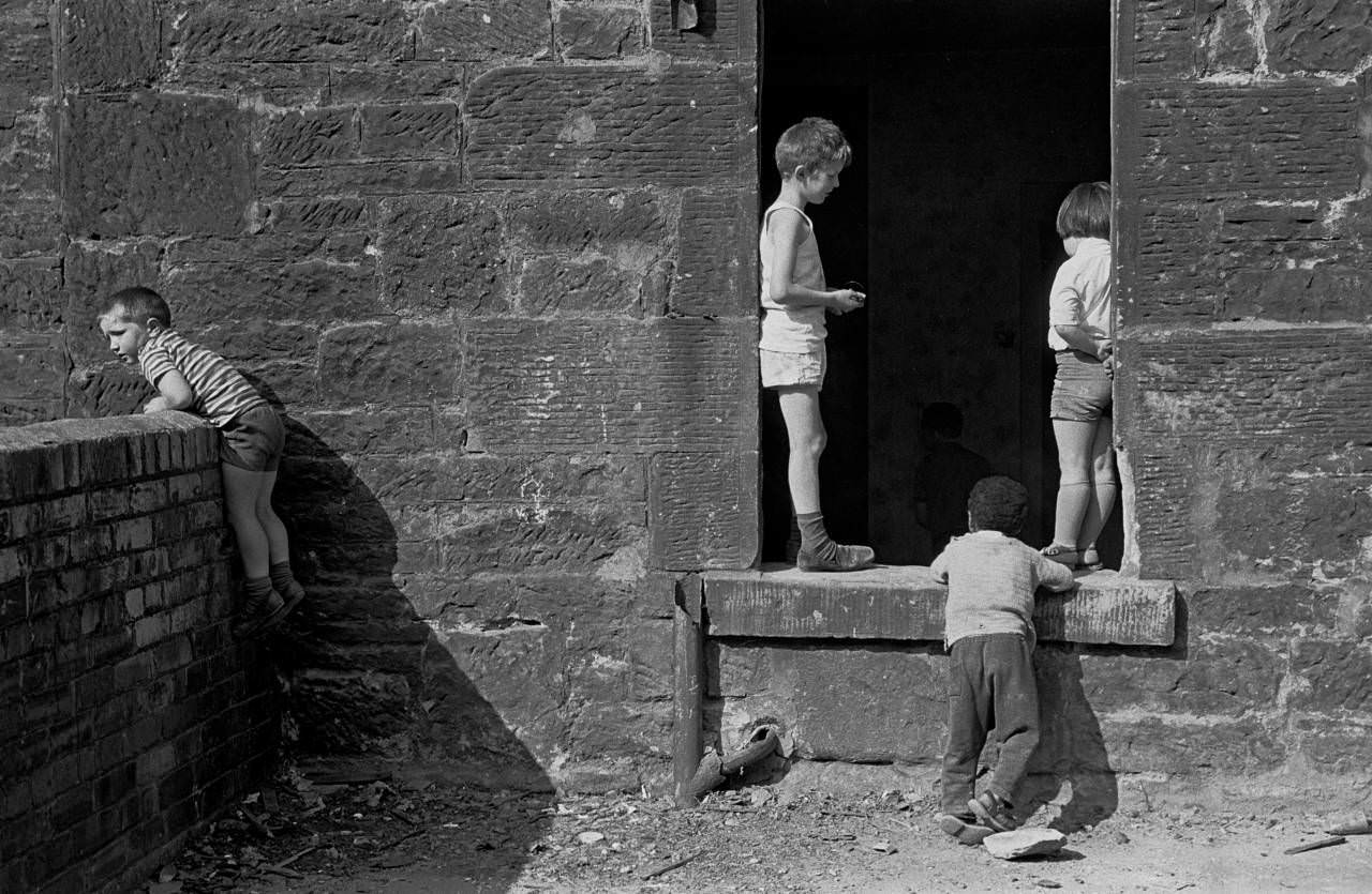 #61 Children playing in an abandoned tenement Maryhill 1971