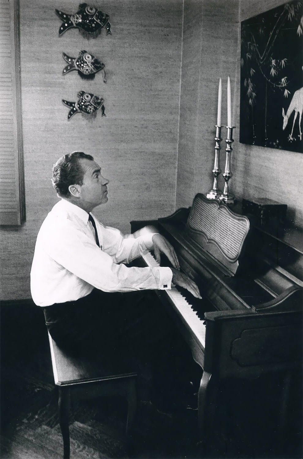 #13 The 37th President of the U.S. Richard M. Nixon plays the piano. USA, New York City, 1966.
