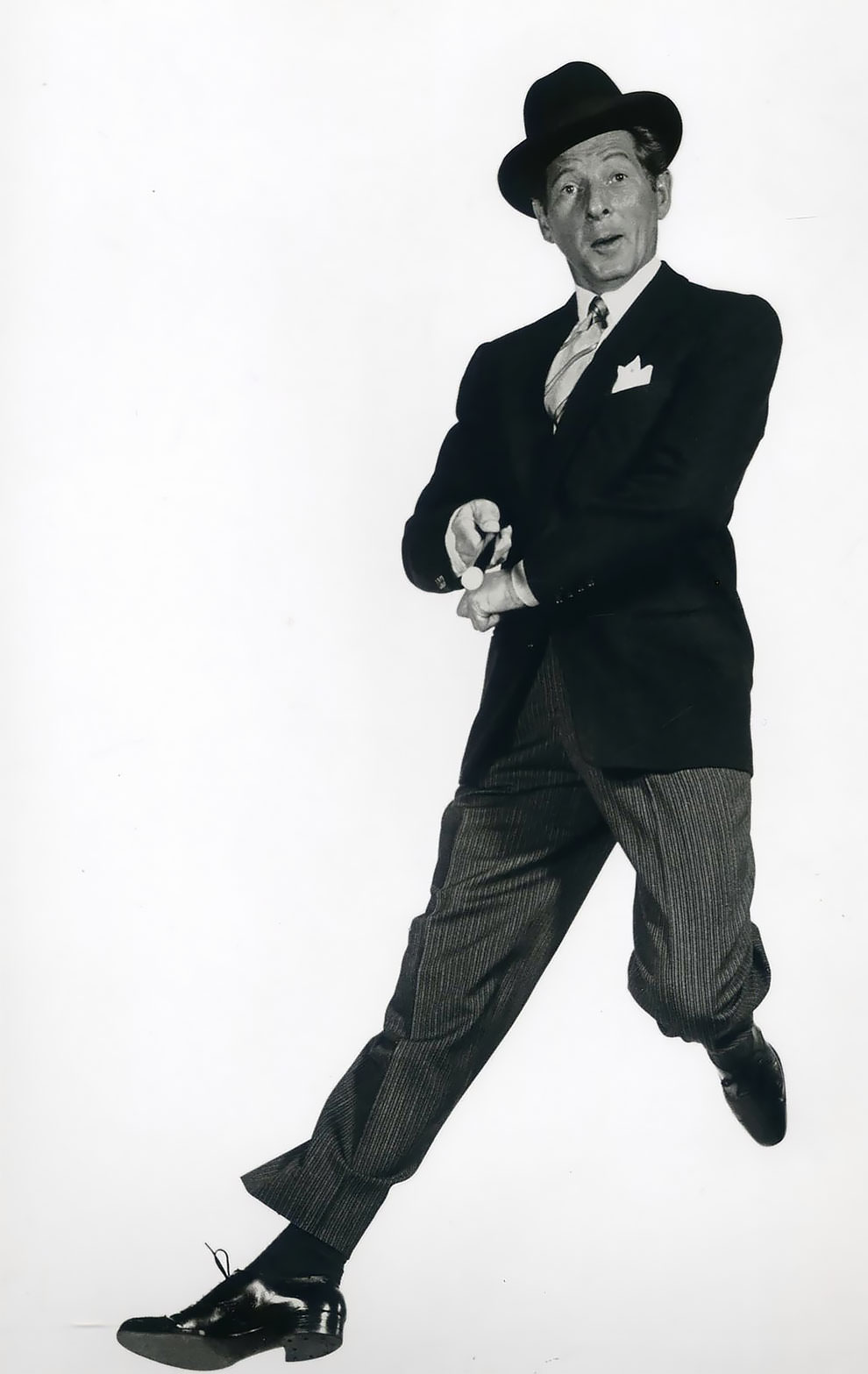 #64 A celebrated American actor, singer, dancer, and comedian Danny Kaye, 1954.