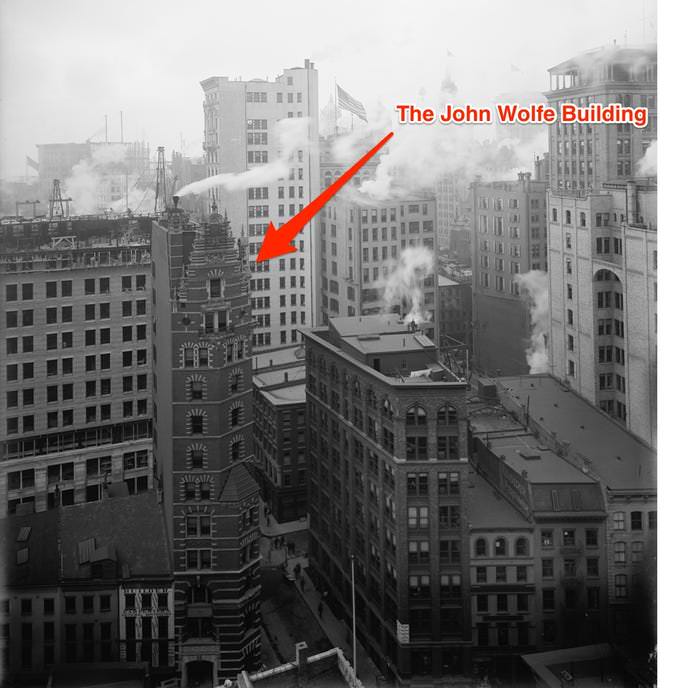 #18 The John Wolfe Building was built in 1895 in the Financial District. It was demolished in 1974 to widen the street.