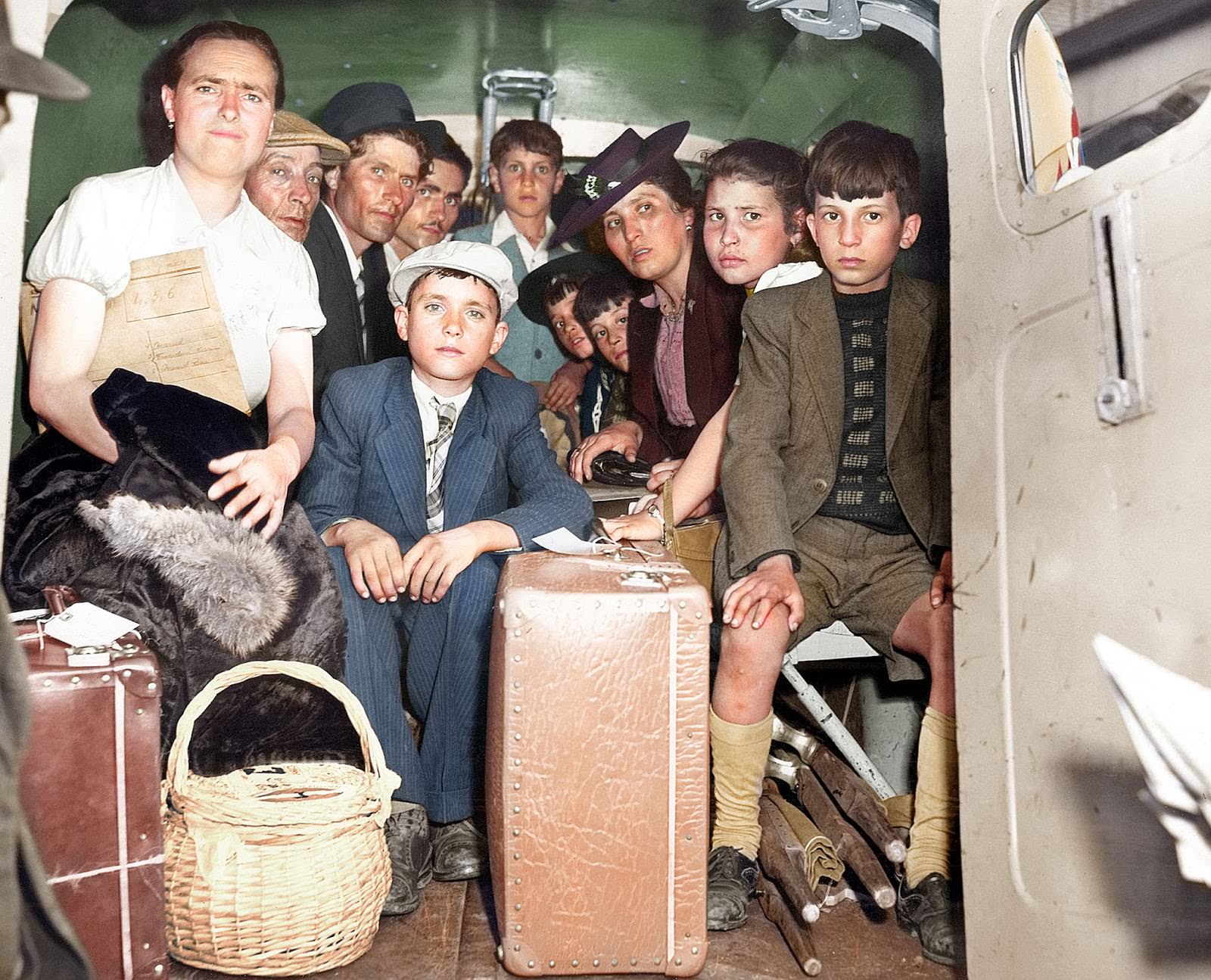 #14 Group of passengers from the Portuguese ship Serpa Pinto, which was stopped by a German submarine and ordered abandoned off Bermuda, are shown after their arrival in Philadelphia, May 31, 1944. The U-boat officers abandoned plans to sink the vessel and permitted the passengers to re-board her after