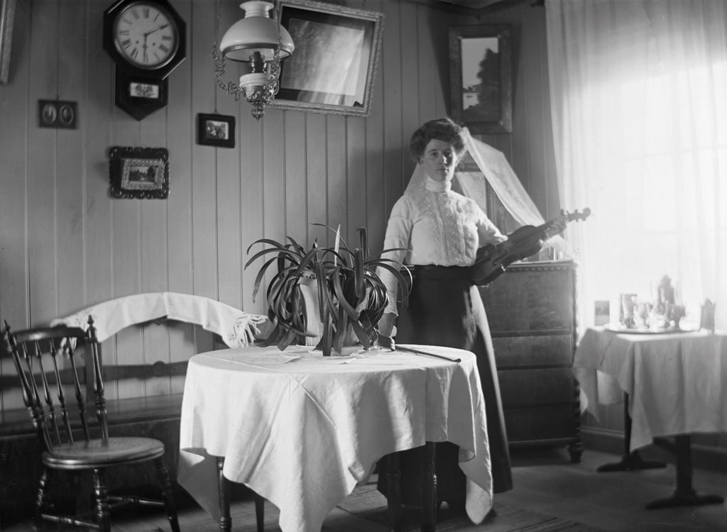 #49 Woman with violin.