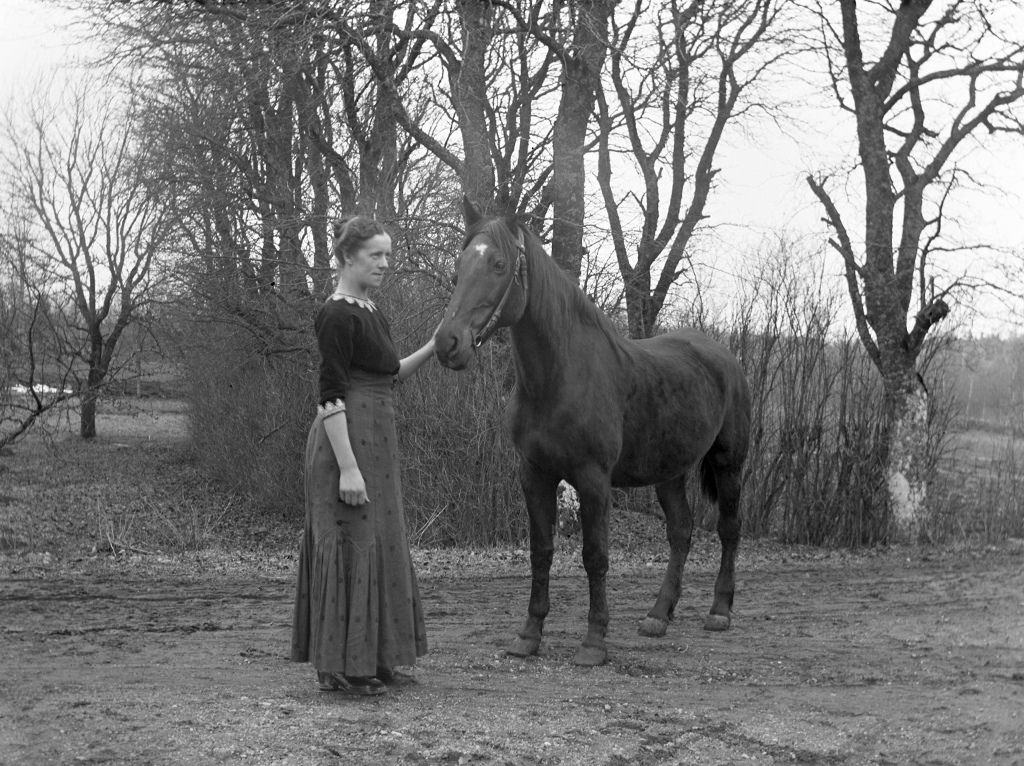 #52 Woman with horse.