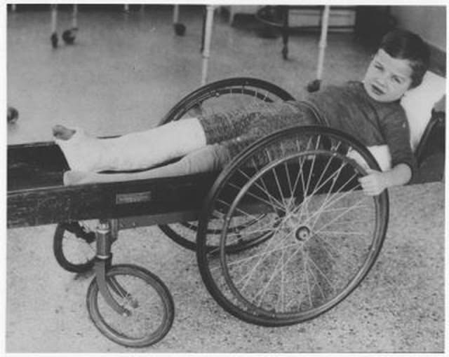 Somewhere between a gurney and a wheelchair, an “invalid rolling cart”, 1915