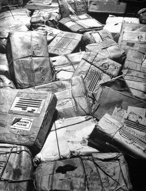 #24 This is a sad memorial – In New York City, 1944, piles of Christmas packages meant for American Servicemen who have been listed as missing or killed in action build up and await a Return to Sender stamp.