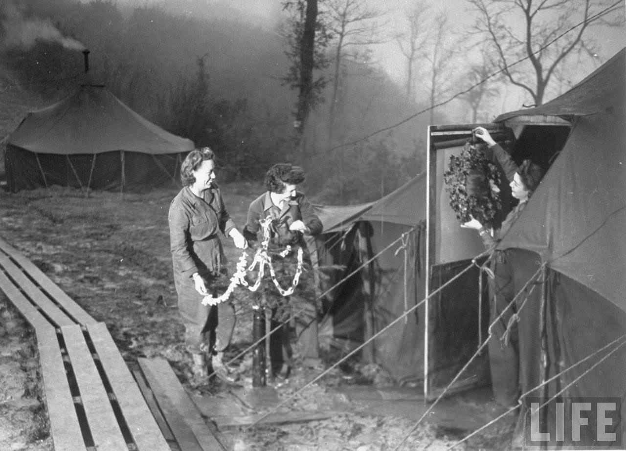 #47 American WACs decorate their tent at the Italian front, 1944.