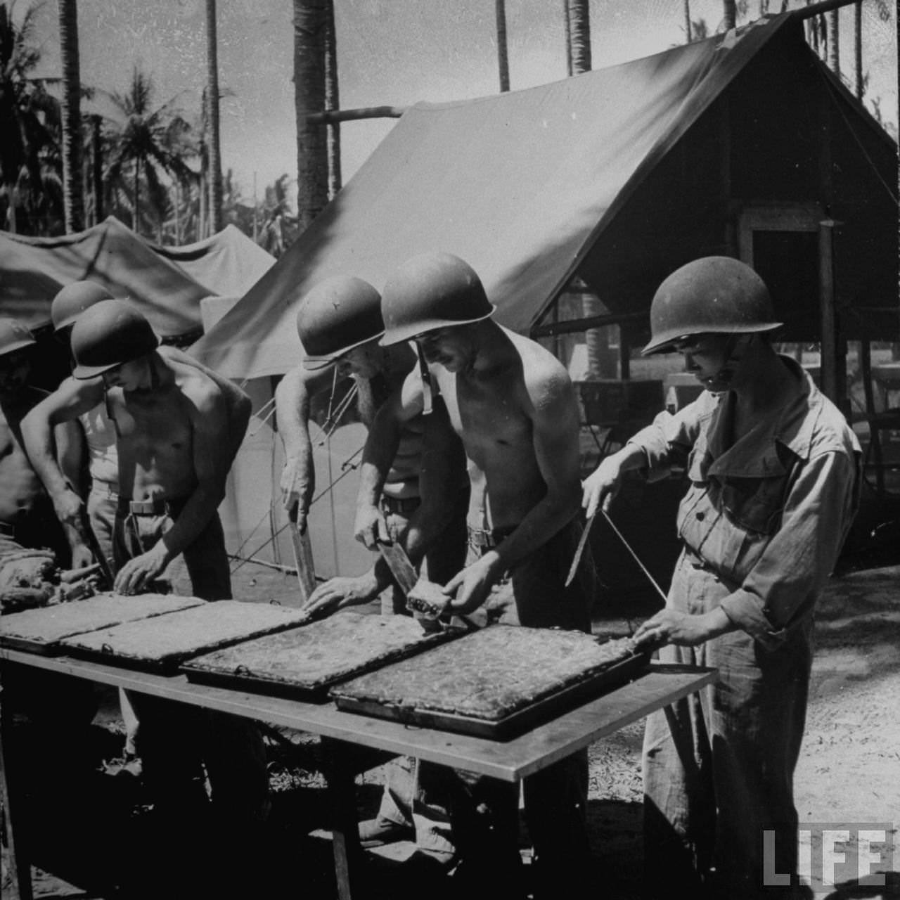 #57 Aloft two geese destined to become Christmas dinner, Germany, 1944.