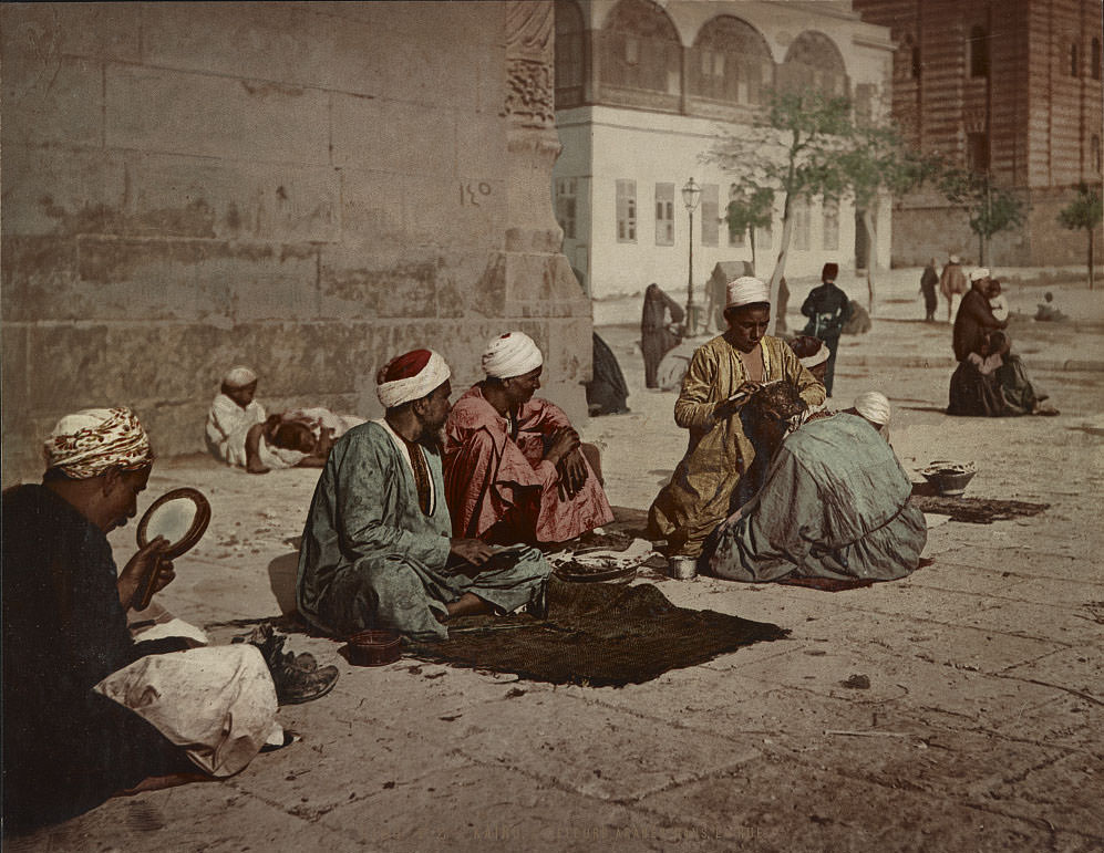 #42 Arab hairdressers on the street, Cairo, 1890s