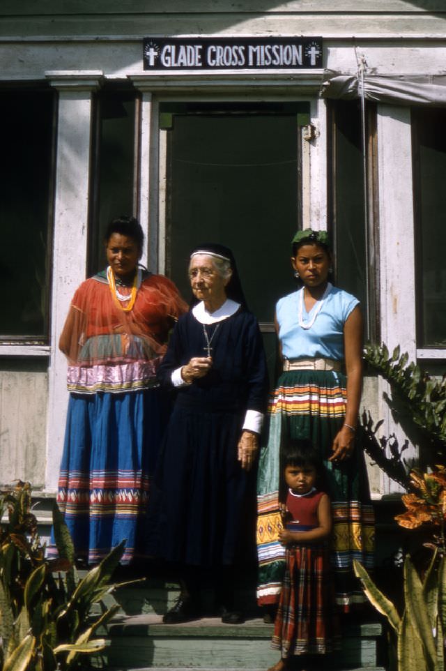 #54 Deaconess Bedell with Seminole Indians at Glade Cross Mission in Everglades City, April 1958