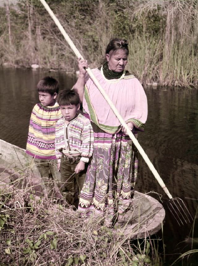#2 Seminole woman and children gigging frogs near the Tamiami Trail, January 3, 1951