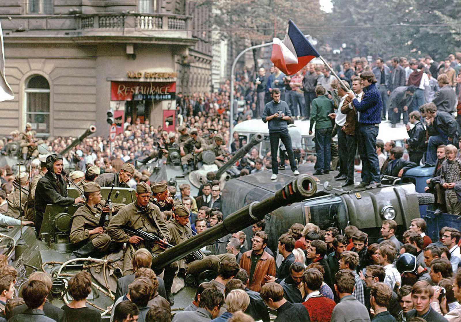 #1 Prague residents surround Soviet tanks in front of the Czechoslovak Radio building.