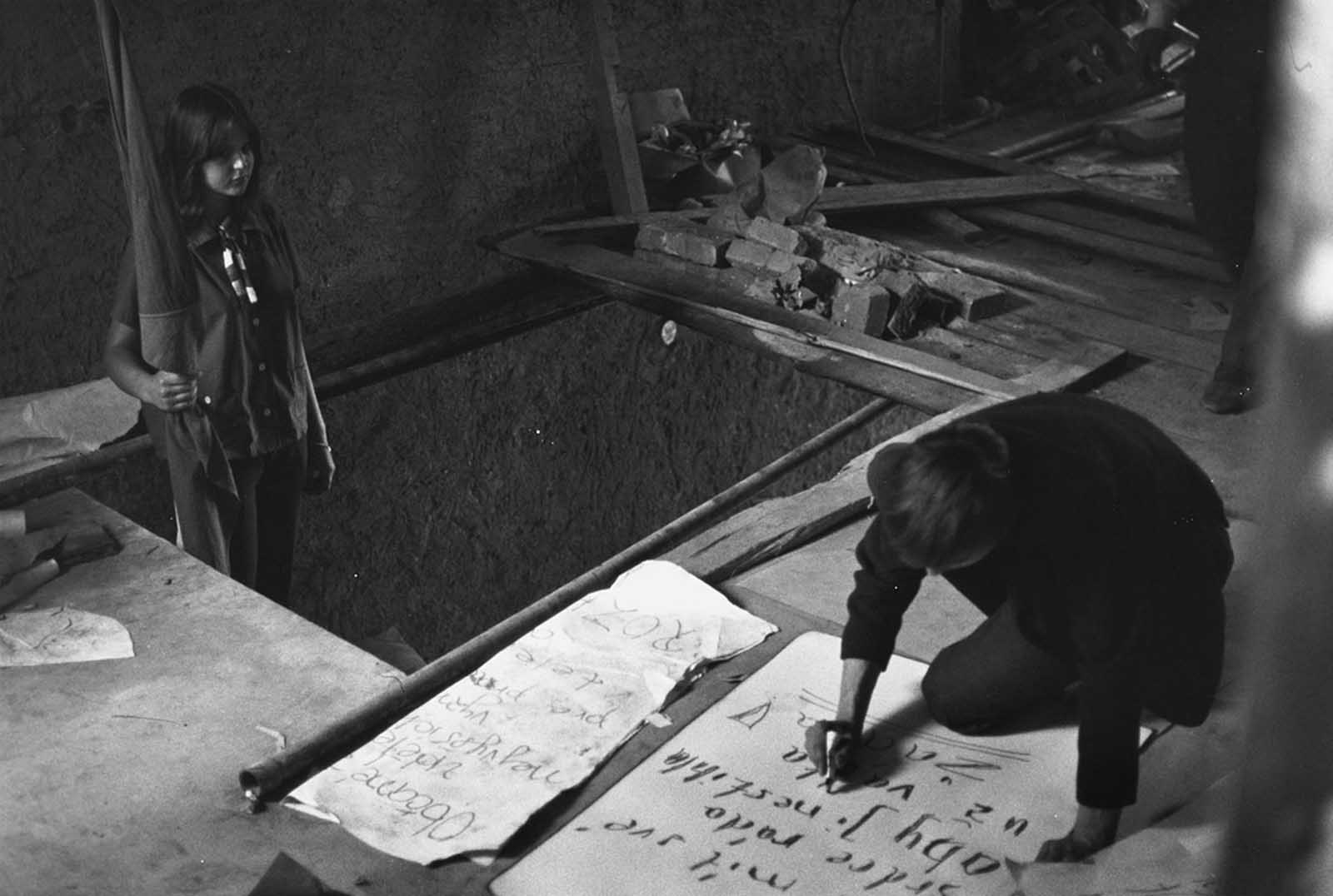 #25 Students in the underground movement make anti-Russian posters on September 3, 1968, in Prague.