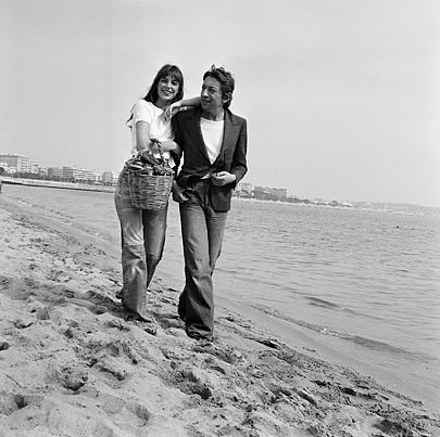 #13 1974, Cannes, France — French singer and songwriter Serge Gainsbourg and his partner, British actress and singer Jane Birkin, attend the 1974 Cannes Film Festival.