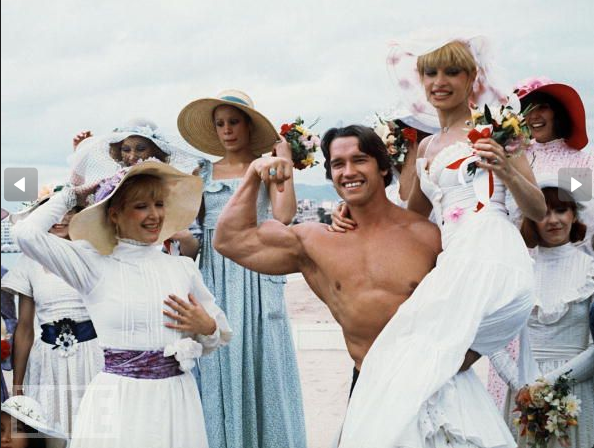 #15 Arnold Schwarzenegger finds a unique way to promote “Pumping Iron” on May 19, 1977 at the 38th Cannes Film Festival.