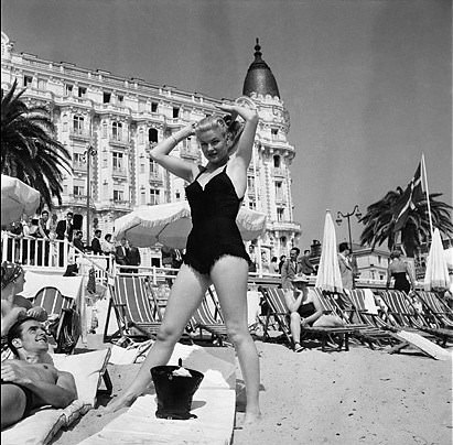 #1 1956, Cannes, France — American actress and dancer, Ginger Rogers, at the 1956 Cannes Film Festival.