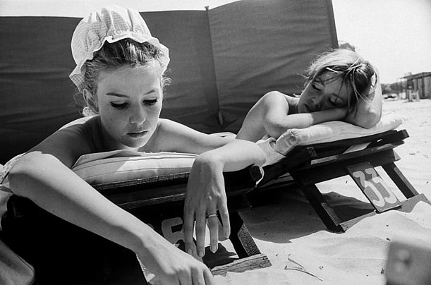 #2 Actress Annette Vadim (L), sunbathing on beach at St. Tropez, French Riviera, w. her sister Mirette Stroyberg (R).