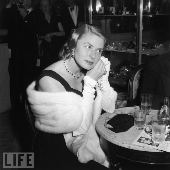 #37 Ingrid Bergman adjusts an earring as she sits at a cocktail table at the Cannes Film Festival in 1956. Jacques Cousteau’s “The Silent World” won the Palm d’Or that year, the only documentary to do so until 2004, when Michael Moore won for “Fahrenheit 9/11.”