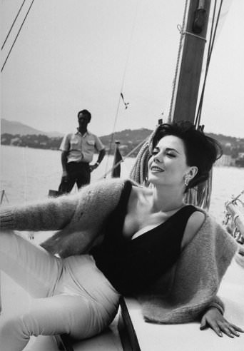 #57 Natalie Wood relaxes on a sailboat during the 1962 Cannes Film Festival.