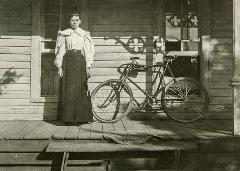 #22 Lady on porch with bike, Greenville, Texas