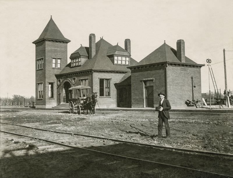 #34 Railroad and horse wagon and man with a box camera, Greenville, Texas