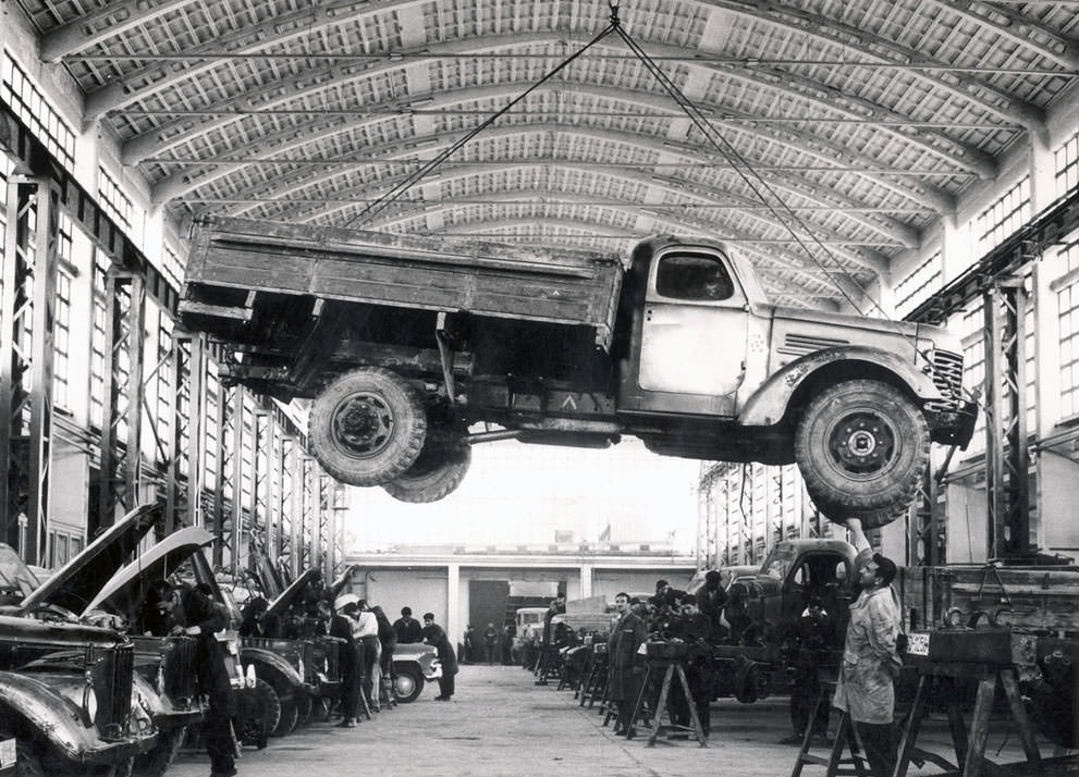 #79 An Afghan worker checks a Russian-made truck in the Kabul Janagalak factory in an unspecified date. The factory situated in the center of the city as the only firm for making vehicle’s chassis was plundered, like other public properties in the Afghan capital, during the Afghan mujahedin rule from 19