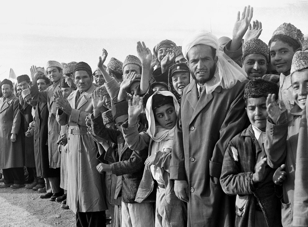 #7 Residents of Afghanistan line the route of U.S. President Dwight Eisenhower’s tour in Kabul, Afghanistan, on December 9, 1959.