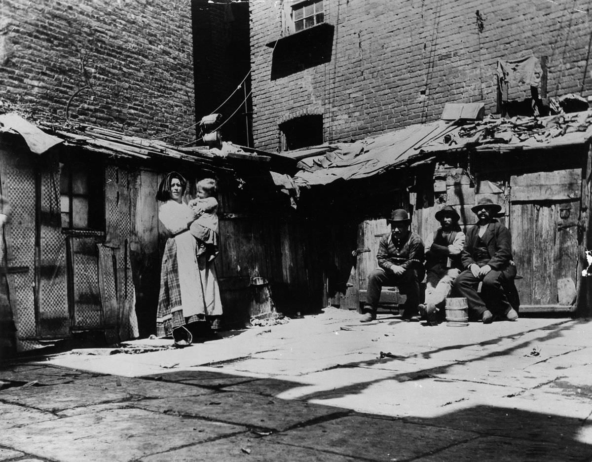 #22 Italian immigrant families living in shacks on Jersey Street, 1897