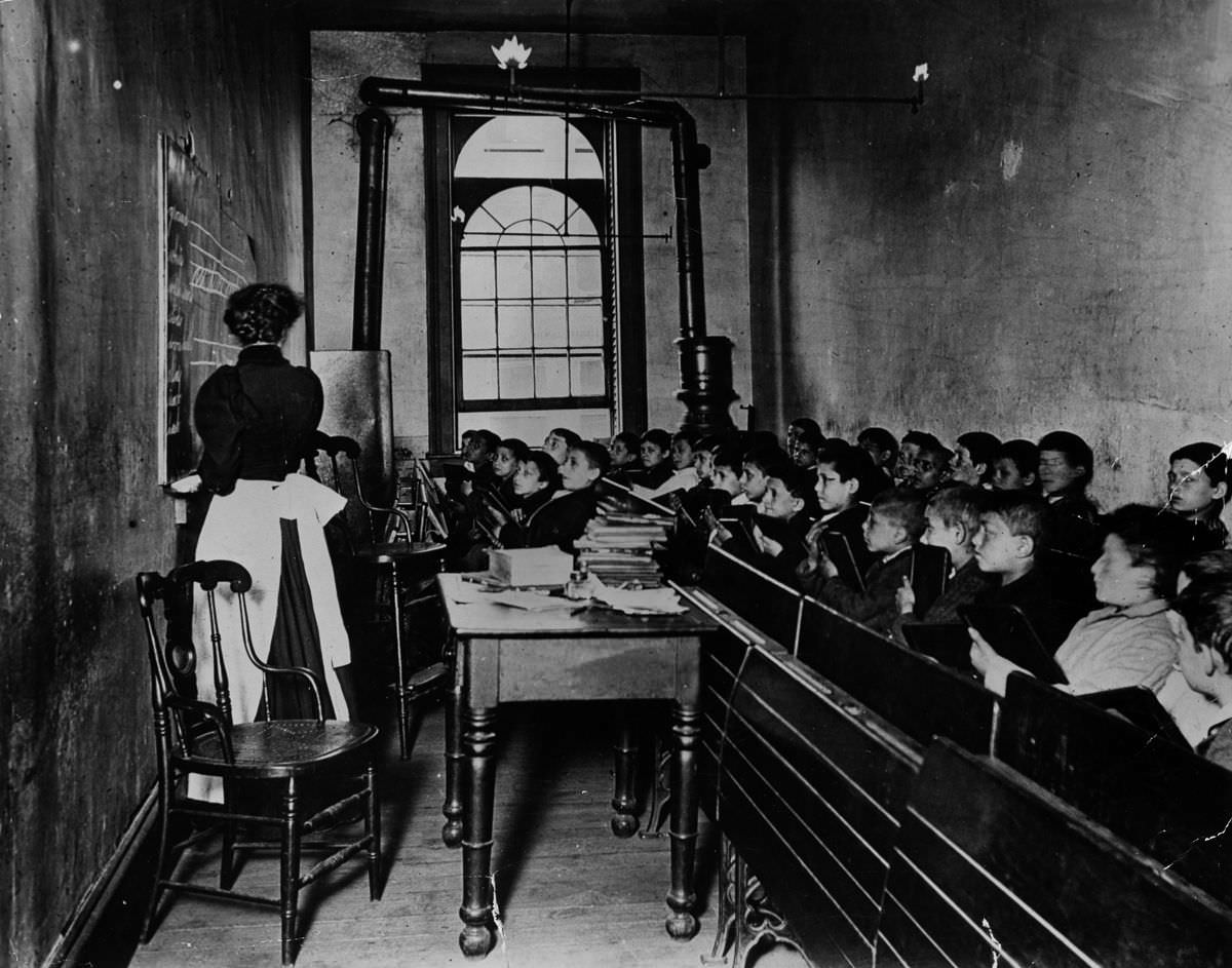#6 Pupils in the Essex Market school in a poor quarter of New York, 1887