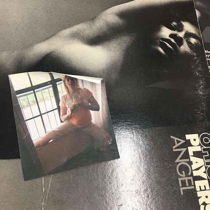 #64 Found this photo of a woman flashing some cash inside this Ohio Players LP.