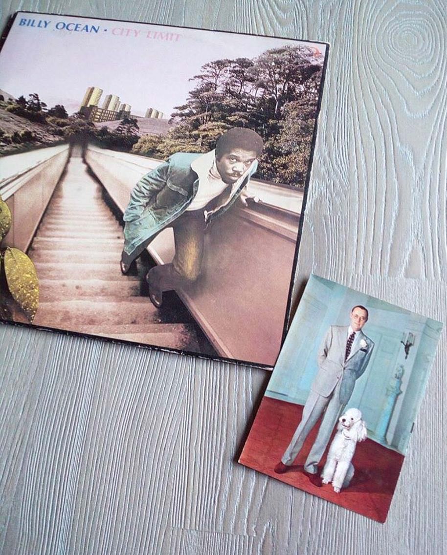 #68 The photo of Prince Bernhard of the Netherlands and a beautiful Standard Poodle inside a copy of ‘City Limit’ by Billy Ocean.
