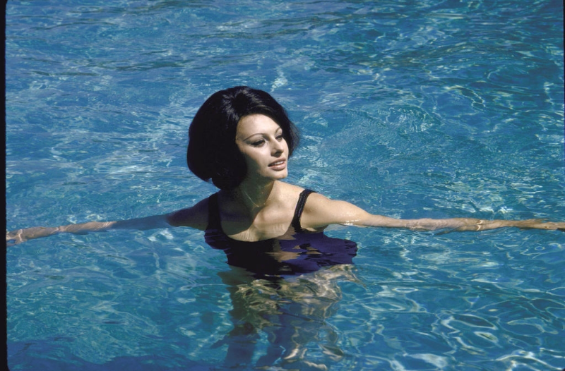 #7 Sophia Loren swimming in the pool at the villa.