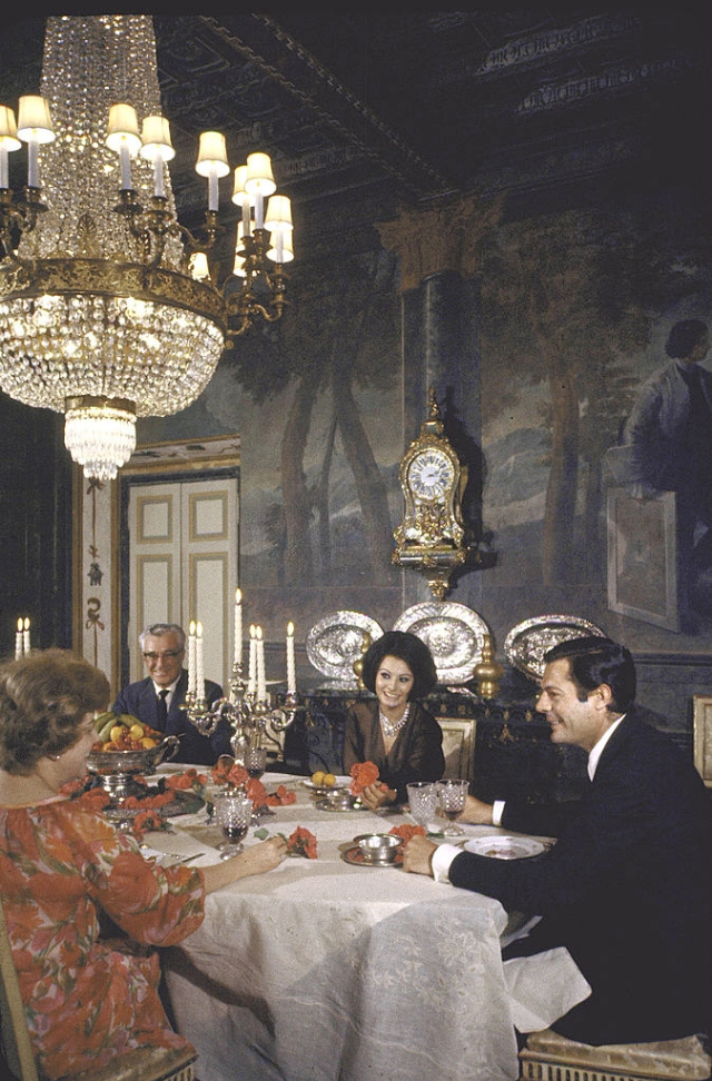 #2 Sophia Loren entertaining Vittorio de Sica, his wife and Marcello Mastroianni in the formal dining room.