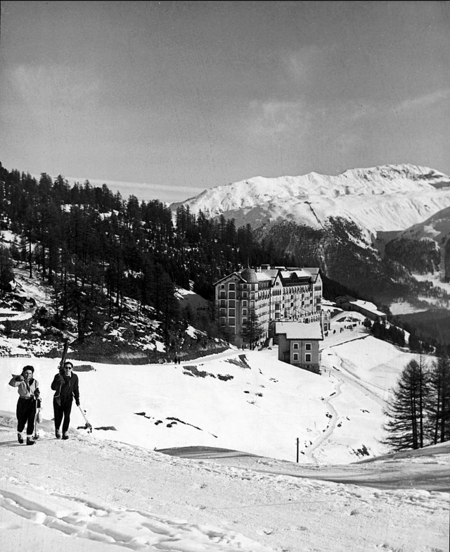 #32 First stop on funicular from village of St. Moritz to the skiing are of Corviglia. Hotel Chanterella in background.