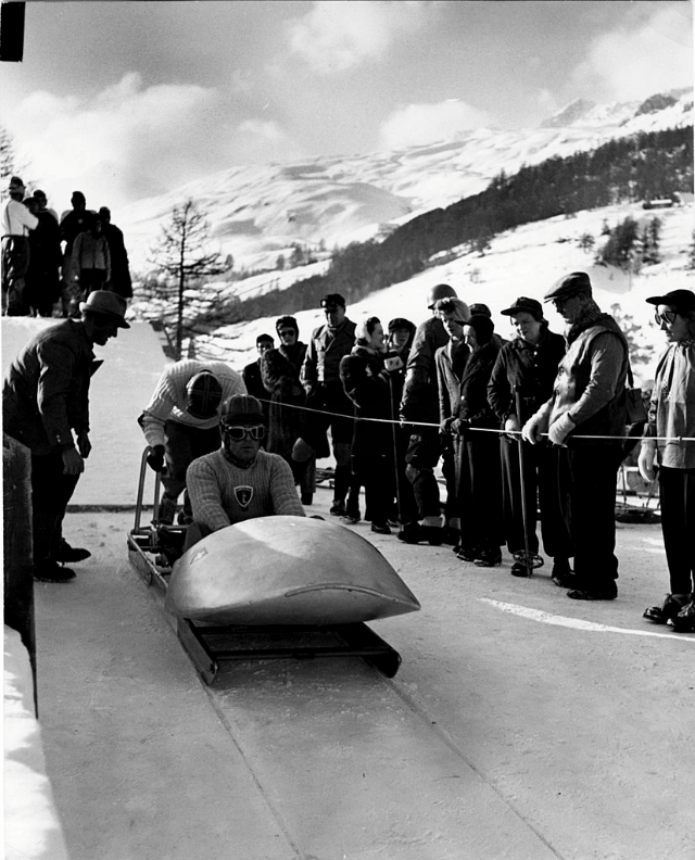 #6 Swiss bobsledders at start of practice run.