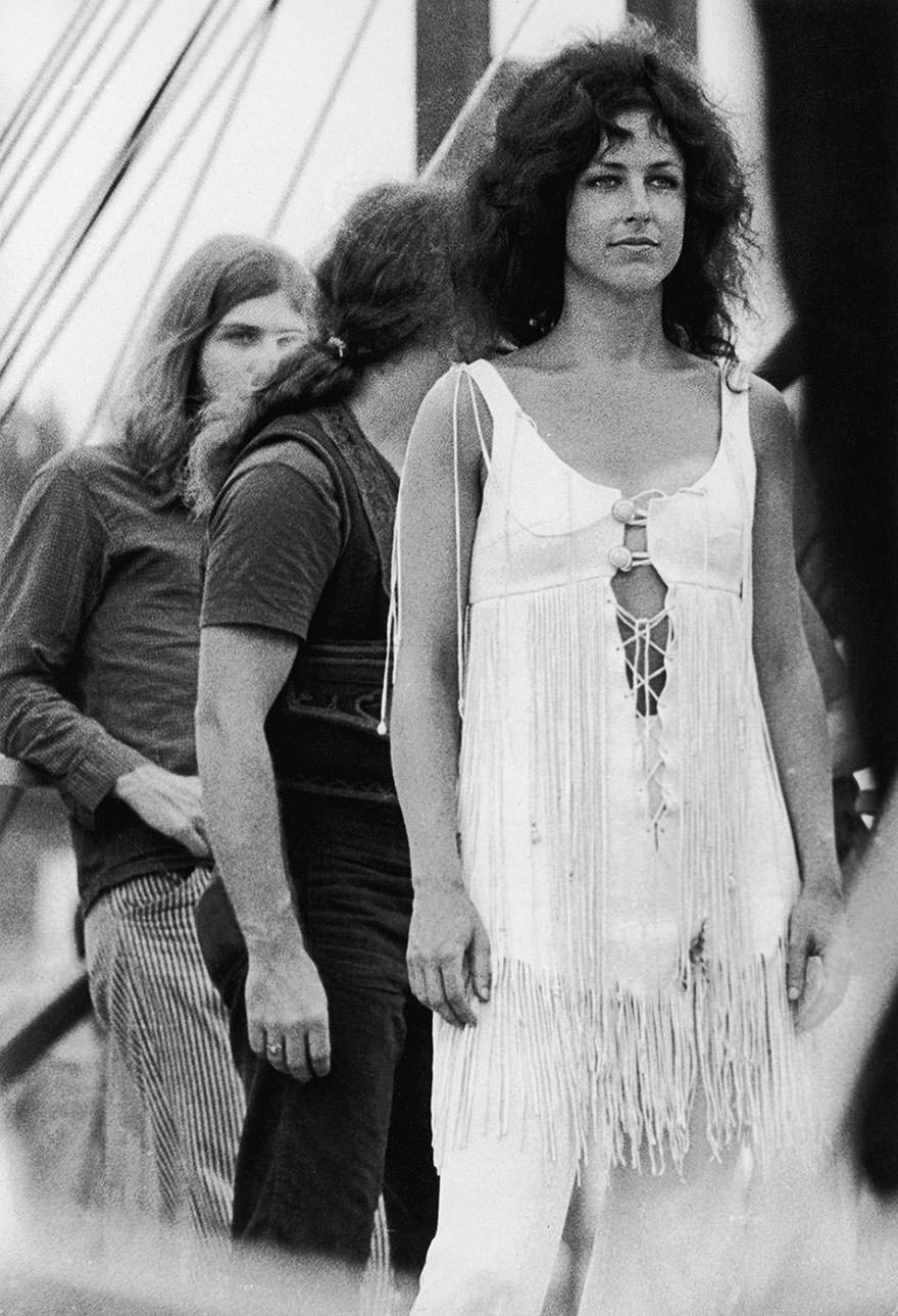 #20 A Man And Woman Lie On The Grass During A Performance On The ‘Free Stage’ At Woodstock