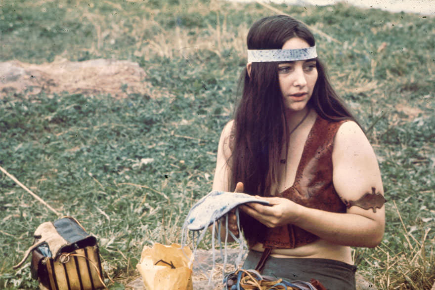 #37 Close-Up Of A Young Woman As She Kneels On The Grass