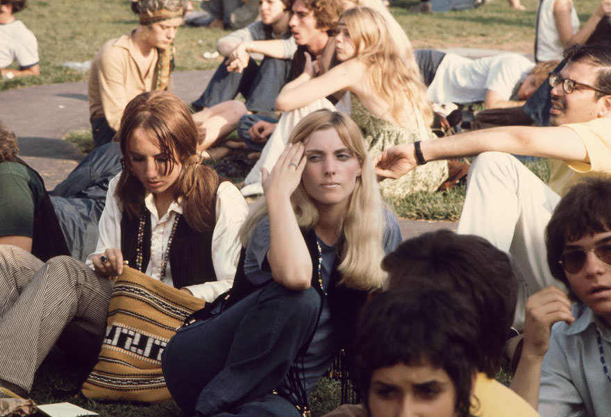 #52 Women Sit On The Grass And Wait For A Bus To Take Them To The Woodstock Music And Arts Fair