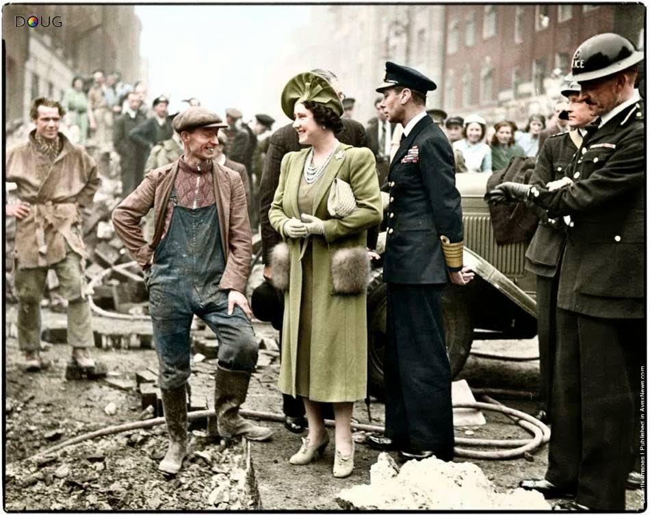 #101 King George VI and Queen Elizabeth visiting bomb damaged streets in the East End of London on the 18th of October 1940