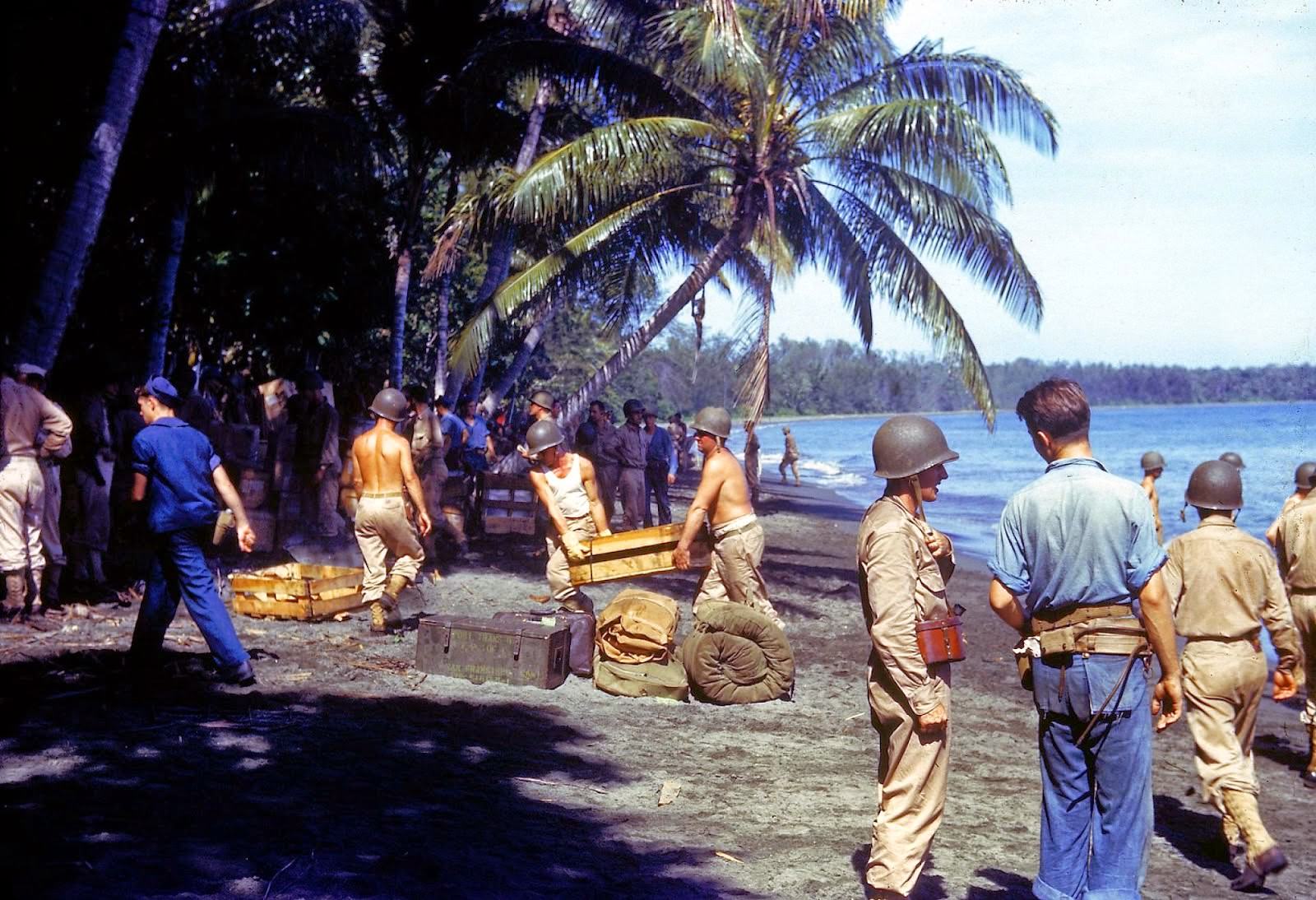 #10 American troops unloading supplies on the shores of Guadalcanal Island in 1943.
