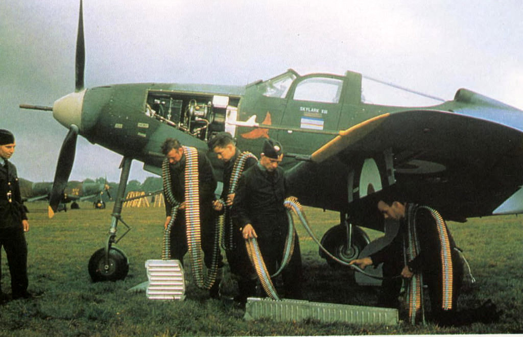 #119 Rearming guns on a RAF P-400 Airacobra from 601 Squadron, it was the only British Squadron ever armed fighters, the P-400 from August, 1941 to March 1942