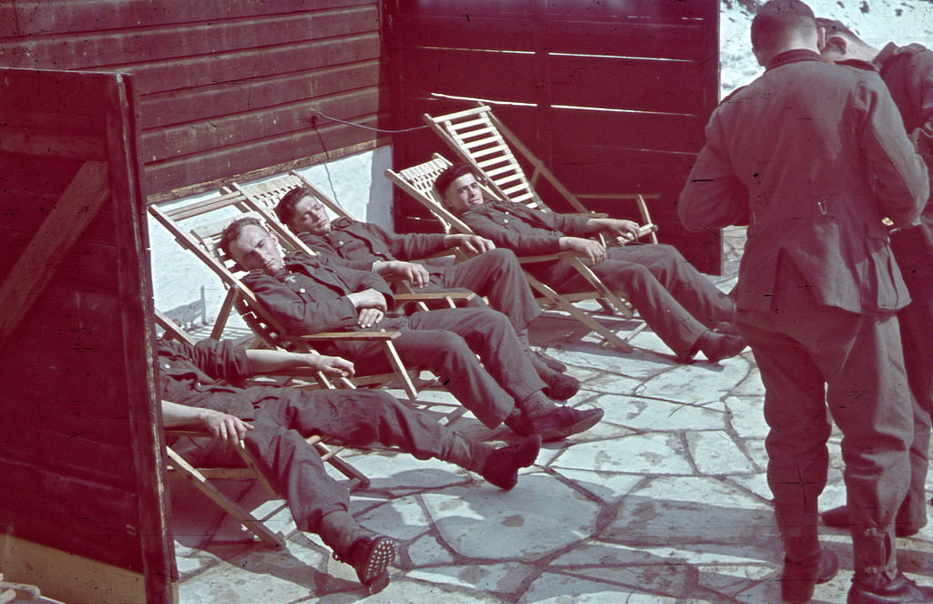 #136 Mountain soldiers of Wehrmacht troops relax on the sun loungers at a hunting lodge