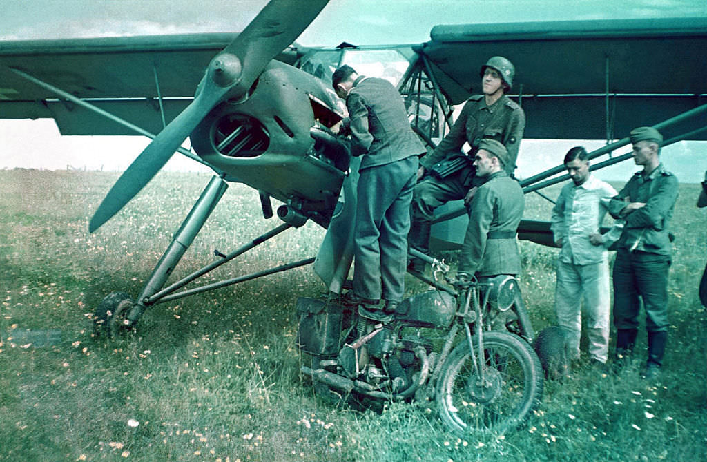 #138 Servicing a Fieseler Fi 156 Storch also a captured British BSA M20 motorcycle